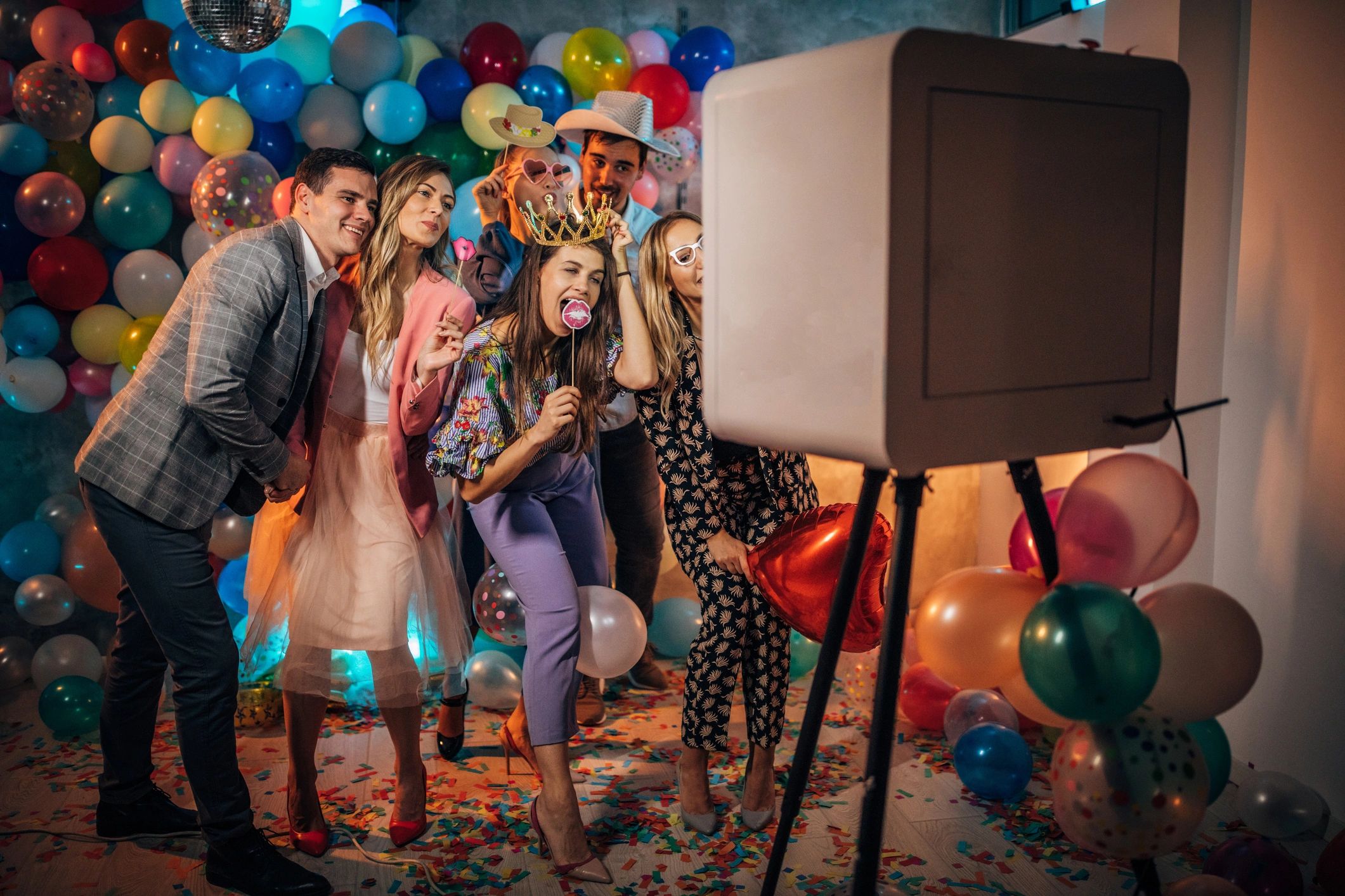Event guests using phone booth rental