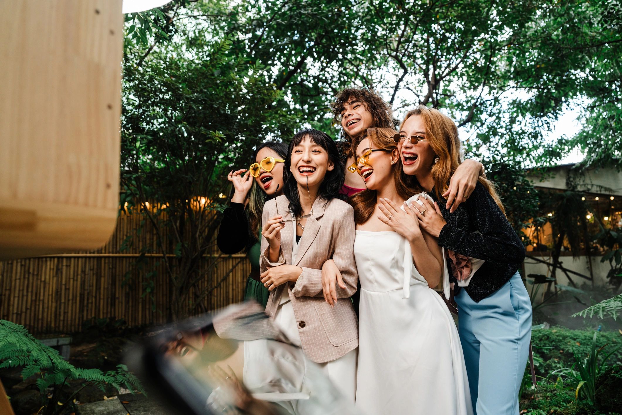 Wedding guests enjoying a photo booth experience